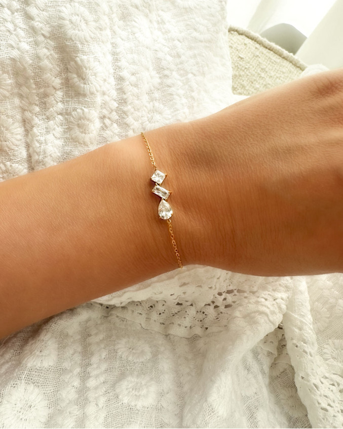 Armband met steentjes triple goudkleurig