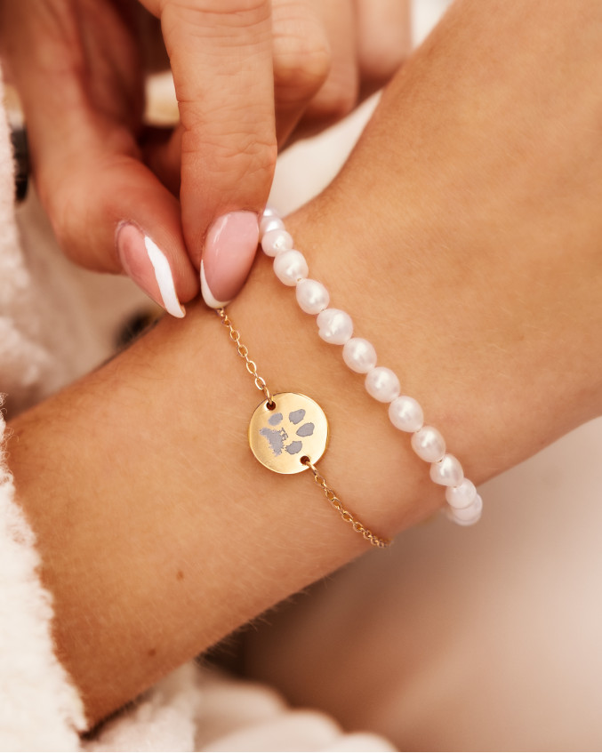 Armparty met parels en hondenpoot