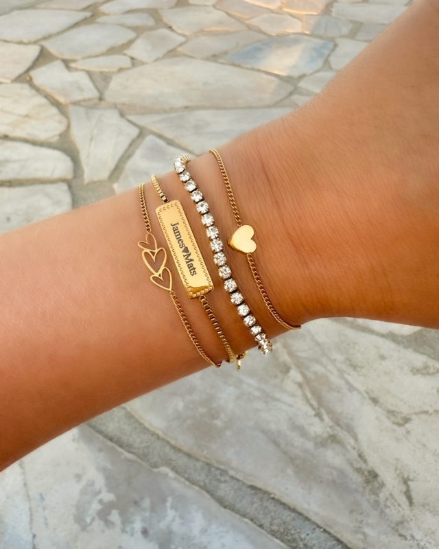 Gouden armparty met hartjes