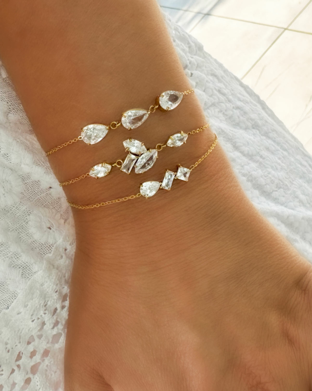 Armband met steentjes triple goudkleurig