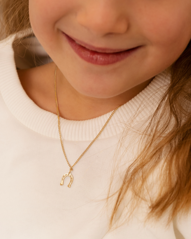 Gouden kinder ketting met hoefijzer