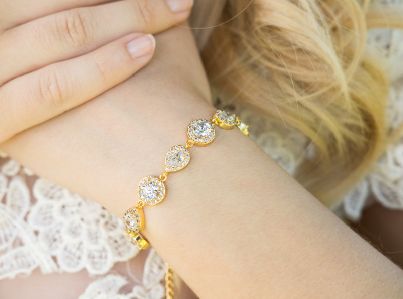 prachtige gouden armband met zirconia in diverse vormen