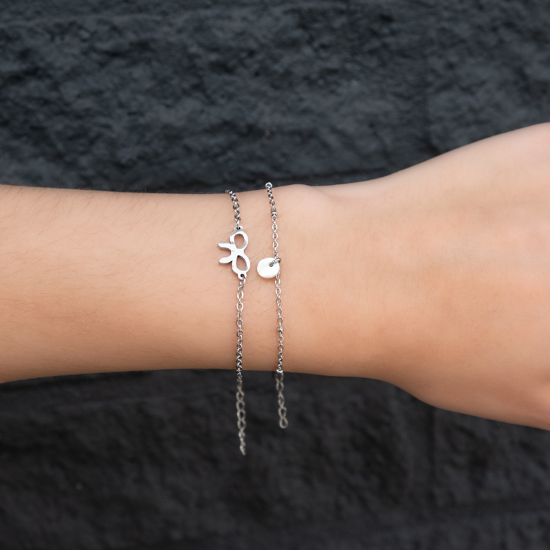 Armbandje met minimalistische schelp en bow armband