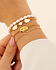 Gouden armparty met parels