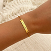 Gouden armband graveren met eigen handschrift