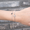 Zilveren armbandjes met hematiet en clover