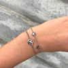 Mix van leuke armparty met klavertjes armbanden