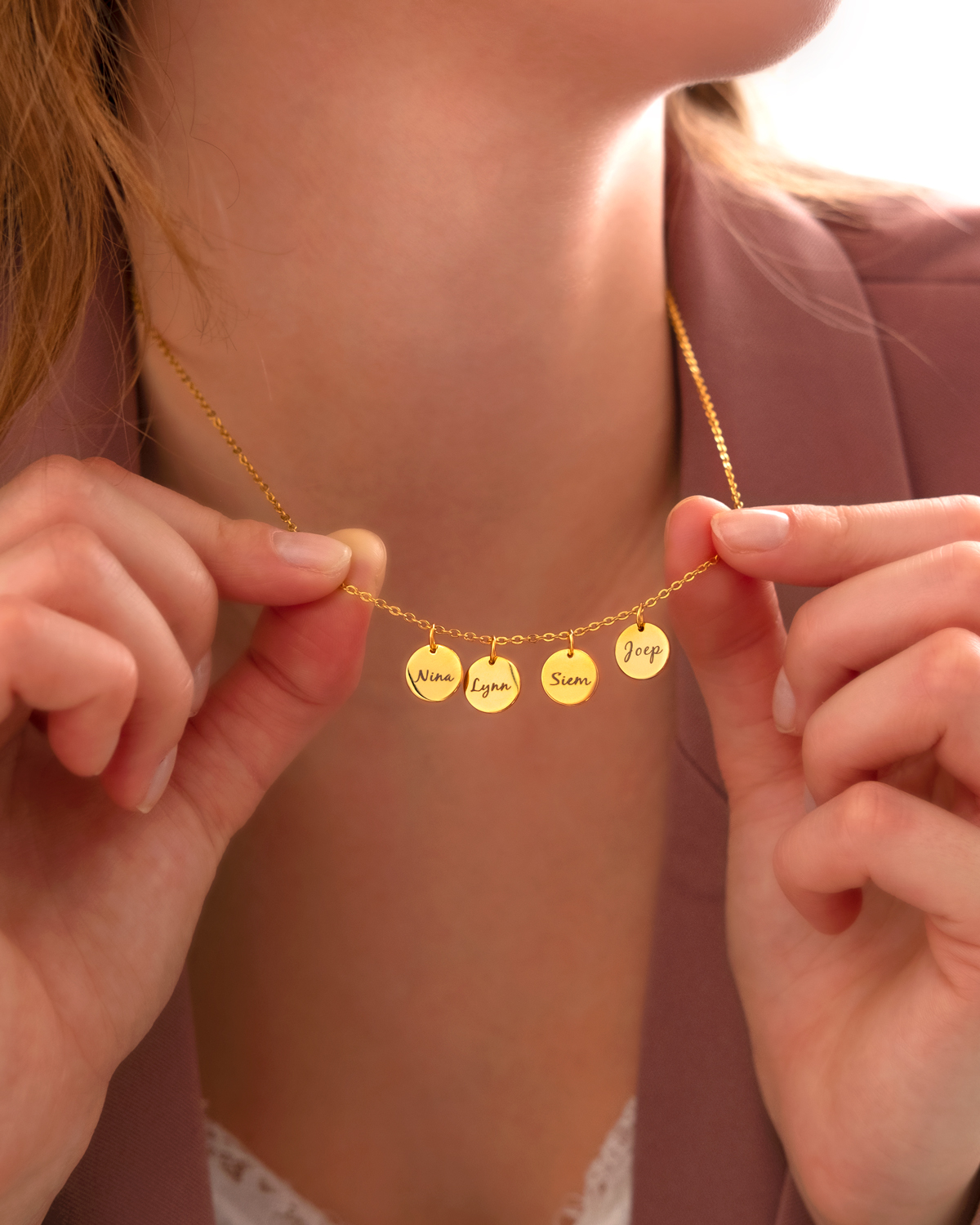 gouden naamketting met muntjes